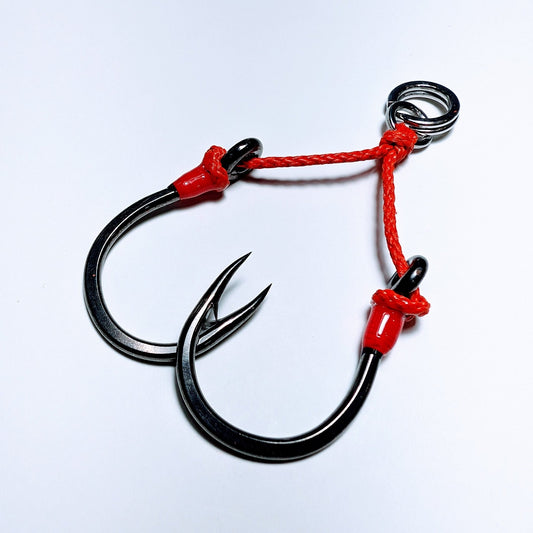A single twin assist hook made with VMC 7264 hooks, 200 lb cord, 300 lb split ring, and a 300 lb solid ring