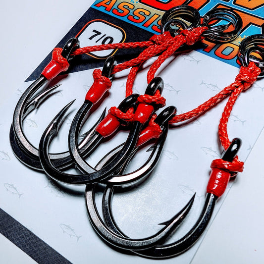 A three pack containing twin assist hook made with VMC 7264 hooks, 200 lb cord, 300 lb split ring, and a 300 lb solid ring